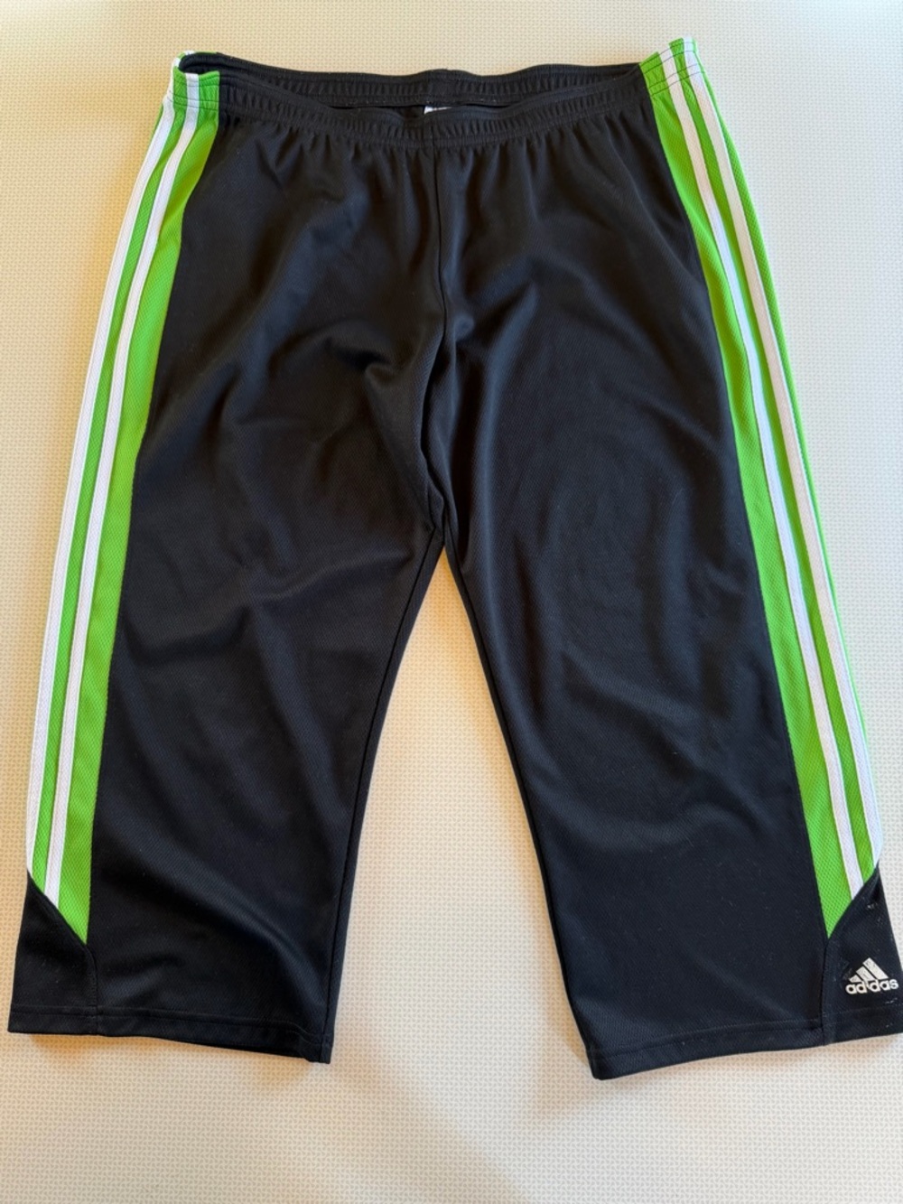adidas Black track carpi with Green and White Side Stripes